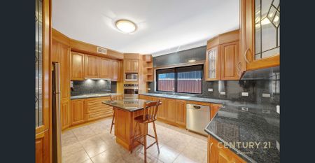 Stylish 4-Bedroom Home with Huge Garage and Family-Friendly Backyard - Photo 2