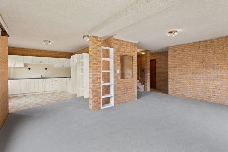 Spacious Family Living with Flexible Floor Plan in Prime Coniston Location - Photo 3