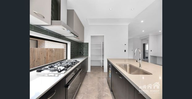 STUNNING and STYLISH brand-new family home with all the bells and whistles - Photo 1