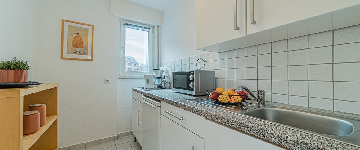 City-Residence: Freundliches Singleapartment in Mainnähe mit großem Balkon - Photo 1