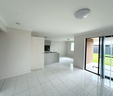 Brand New Home with Ducted A/C - Photo 2