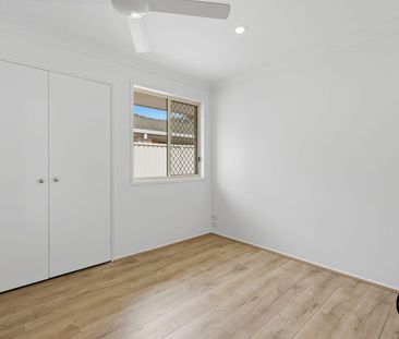 Freshly Updated Dual Living Home with Pool in Prime Carrara Location - Photo 4