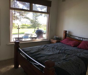 Beachside Living at Its Best - Upstairs Coastal Gem on the Esplanade - Photo 3