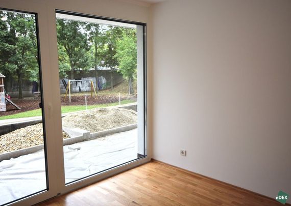 Helle 2-Zimmer Wohnung mit Klimaanlage, kleinen Garten und Garage sowie 200m von U-Bahn-Station Zippererstrasse - Photo 1