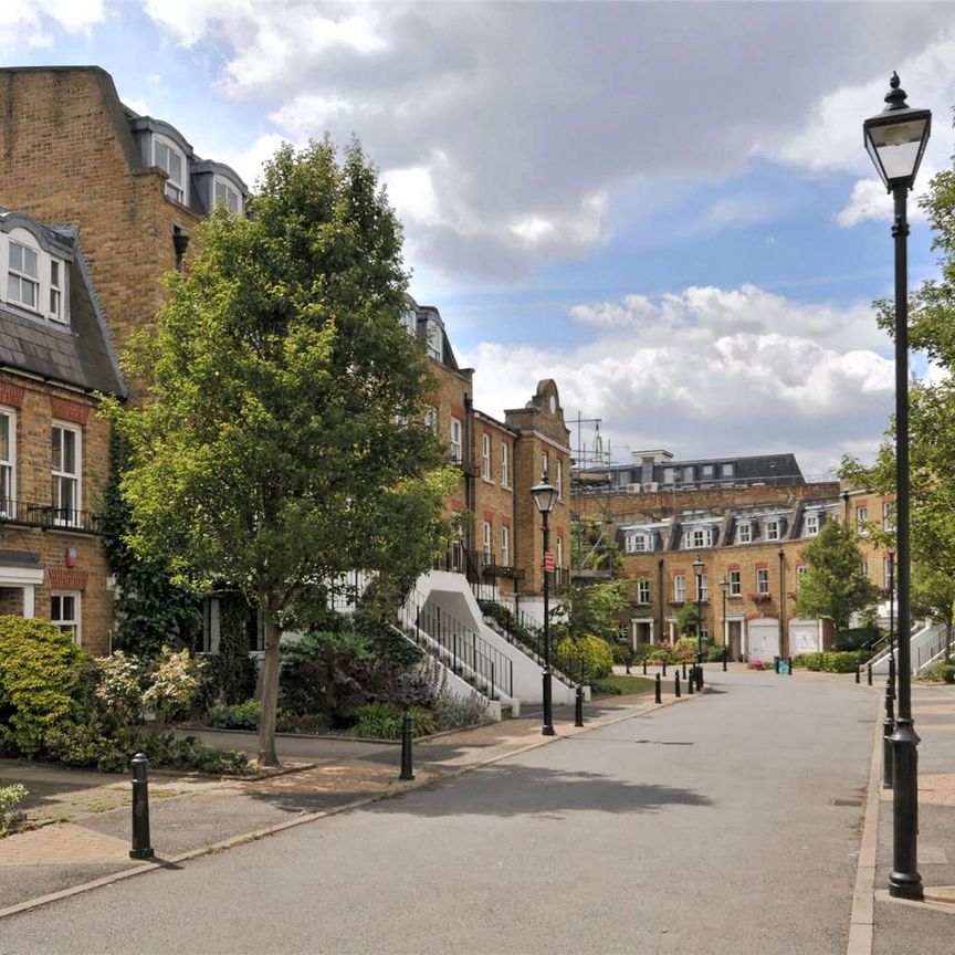 Modern 4 bedroom townhouse in a secure gated development, close to Hampstead Heath ponds, and overground station. - Photo 1