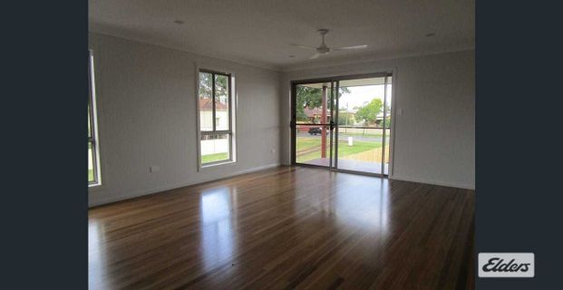 Stylish Four-Bedroom Home with Contemporary Features - Photo 1