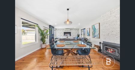 STYLISH, SECURE & SET TO IMPRESS FOUR BEDROOM HOME - Photo 5