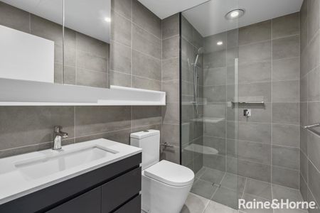 Modern Tri-Level Home in a Prime Edmondson Park Location! - Photo 2