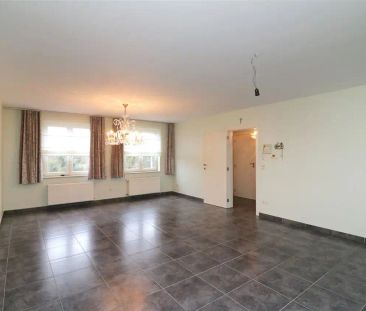 Duplex met lif tot slaapniveau, groot terras & garage - Photo 1