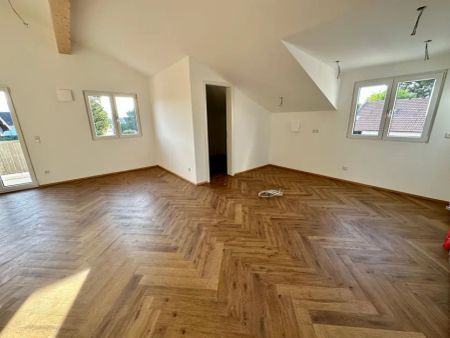 Traumhafte Dachgeschosswohnung mit herrlichem Ausblick! - Photo 3