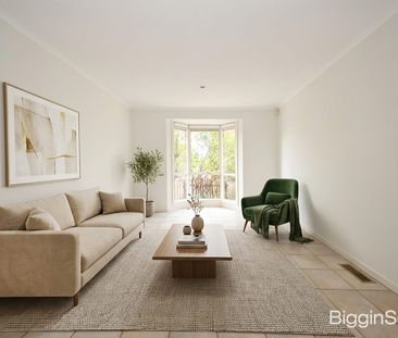 Light-Filled North-Facing Living in a Convenient Location - Photo 1