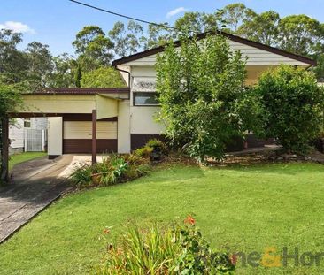 THREE BEDROOM FAMILY HOME WITH A SPACIOUS BACKYARD!! - Photo 1