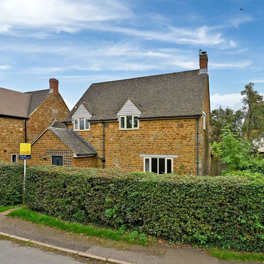 Modern family home in sought after village - Photo 1