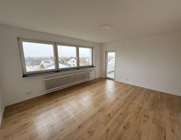 Moderne und lichtdurchflutete 3 Zimmerwohnung mit weitem Ausblick auf Rodgau und den Taunus - Foto 1