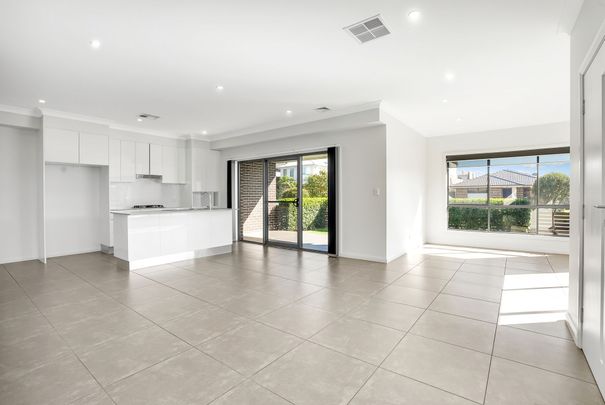 PERFECTLY PRESENTED FOUR BEDROOM HOME! - Photo 1