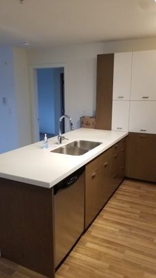 Bright 2 bed + den, 2 bath @ MODE - Photo 1