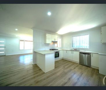 RENOVATED THROUGHOUT! - Photo 4