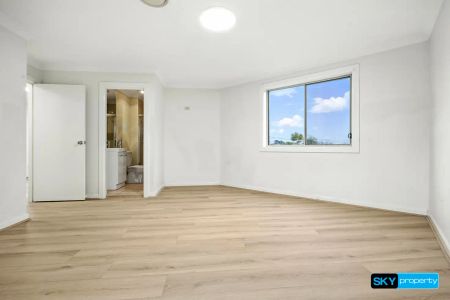 “Newly Renovated 4-Bedroom Family Home with Entertainer's Backyard + Secure Front Yard” - Photo 5