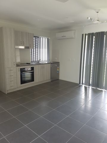 2/1 Gooloowan Circuit, Brassall QLD 4305 - House For Rent | Domain - Photo 5