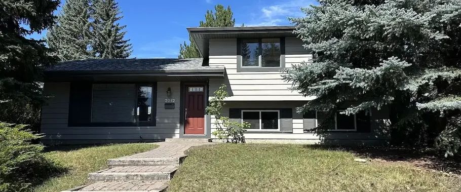 Beautifully renovated split level in desirable Palliser | 2212 Paliswood Place Southwest, Calgary - Photo 1