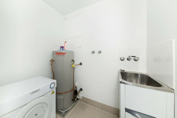 Convenient Living with Space and Comfort - Photo 1
