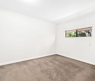 Two Bedroom Home with Spacious Yard and Double Garage - Photo 1