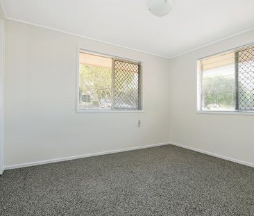 Renovated unit in sought after location - Photo 5