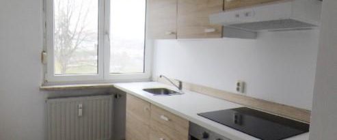 Zweckmäßige 3-Zimmer-Wohnung mit Einbauküche - Foto 1