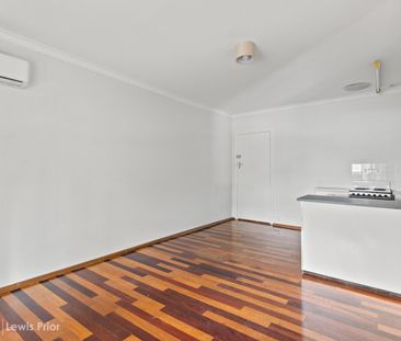 Affordable Neat & Tidy Unit Located Close to the CBD - Photo 1