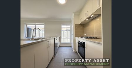 Beautiful Brand-New Family Home with Solar & Second Living Area - Photo 2