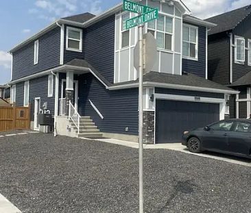 EXECUTIVE 6 BEDROOM HOME IN SOUTHWEST CALGARY with separate entrance suite | 171 Belmont Crescent Southwest, Calgary - Photo 1