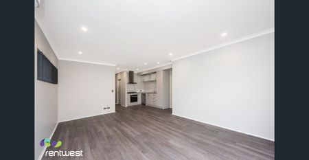 Modern 3-Bedroom Residence with Quality Finishes & Double Garage - Photo 4