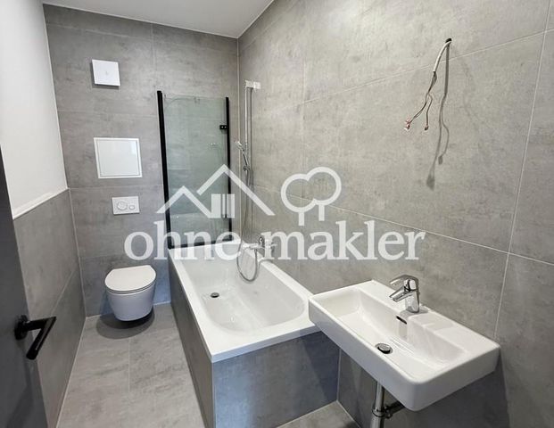 Attraktiv & praktisch: 2-R-Whg im DG mit Wärmepumpe und separatem Hauswirtschaftsraum - Photo 1