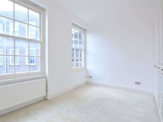 Large two bedroom, two bathroom apartment with a terrace set within a portered block moments St. John's Wood High Street - Photo 1