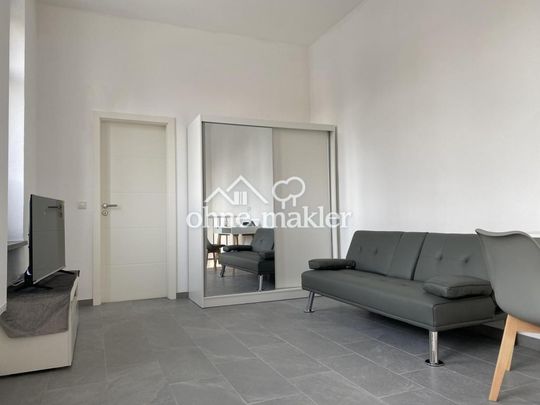# Frisch renoviertes Design-Apartment – voll möbliert, 2 Bäder & Garten inkl. WLAN in zentraler Lage - Photo 1
