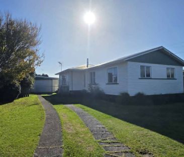 Spacious 3 Bedroom Home with Large Deck & Garage - Photo 2