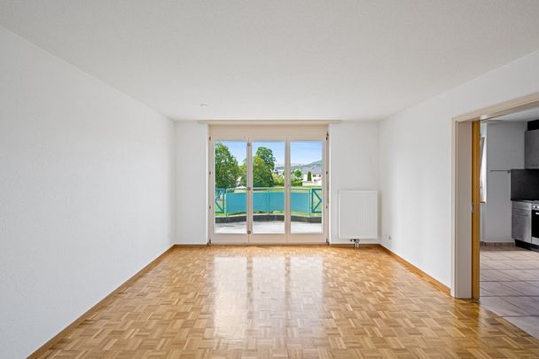 Appartement de 4 pièces au rez-de-chaussée avec balcon - Photo 1