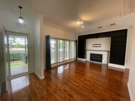 Spacious 4-Bedroom Home with Large Backyard and Outdoor Entertaining Area - Photo 1