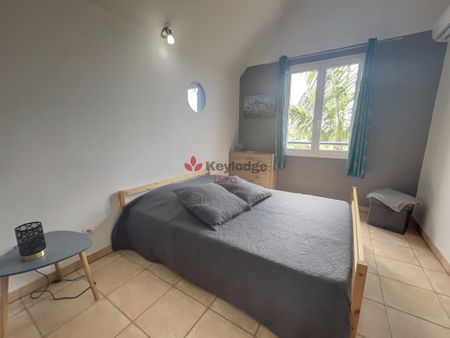 Location Appartement 2 pièces 52m² LA POSSESSION 97419 - Photo 2