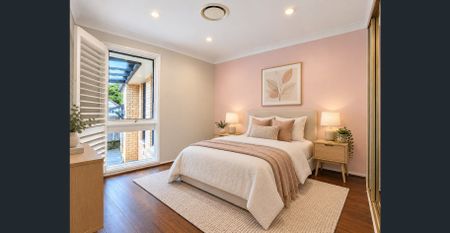 Spacious Four-Bedroom Family Home with Multiple Living Areas - Photo 3
