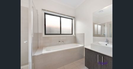 Stylish Family Home with Two Living Areas - Photo 4