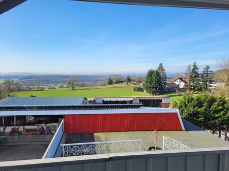 Dachgeschosswohnung mit Balkon und traumhaften Ausblick ins Grüne! - Photo 5