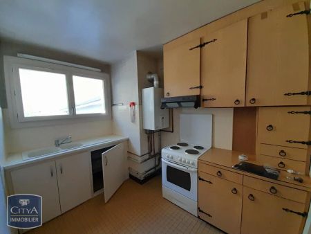 Appartement à louer 4 pièces 71.09m² - Photo 3