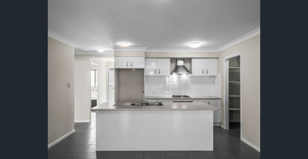 Large Family Home Featuring Two Living Areas - Photo 1