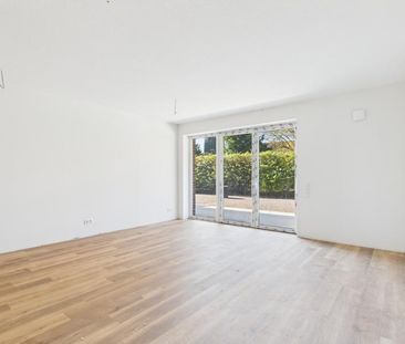 Moderne Erdgeschosswohnung mit Terrasse – Erstbezug in ruhiger Lage - Foto 1