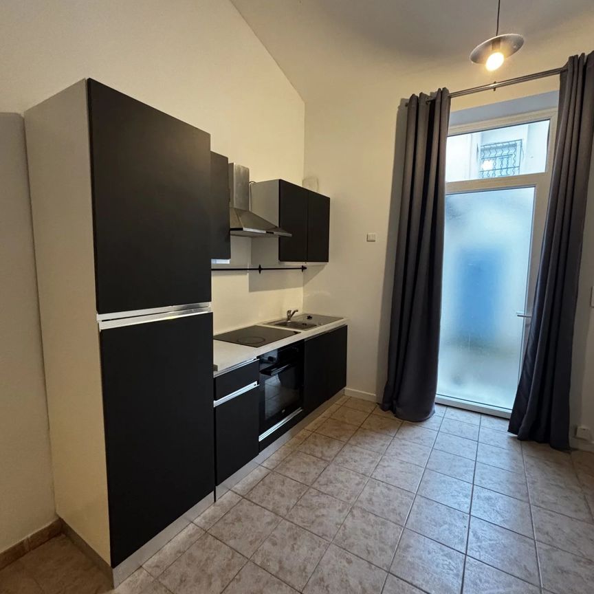 Location Appartement 2 pièces 37m² NIMES 30000 - Photo 1