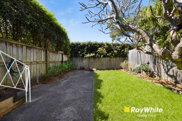 Spacious and Stylish Family Home with Sunroom and Large Backyard - Photo 1