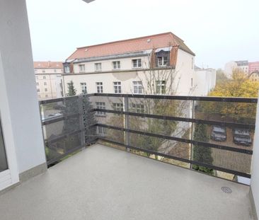 Helle Wohnung mit großem Wohnzimmer und Westbalkon - Foto 6