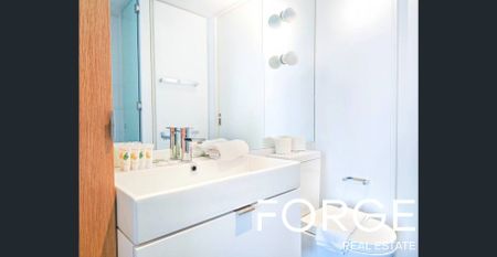 Sleek Inner-City Apartment Living - Photo 3