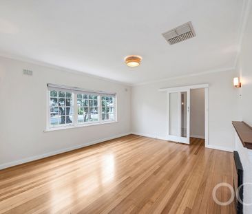 Open the Door to Classic Comfort Just Steps from the Coast - Photo 3